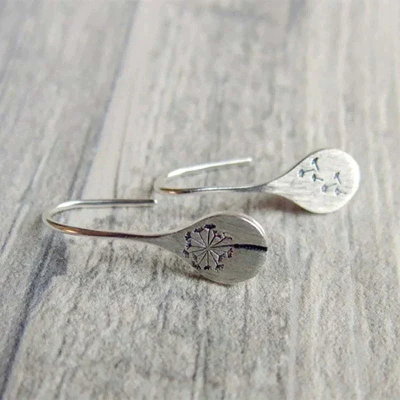 Boucles d'oreilles vintage en argent avec fleurs