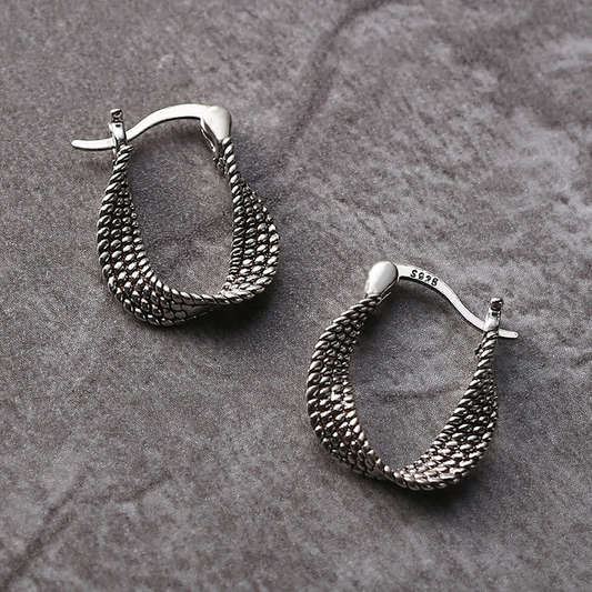 Boucles d'oreilles en argent asymétriques chic