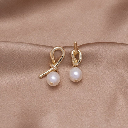 Boucles d'oreilles en or et perles d'eau douce