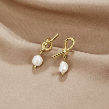 Boucles d'oreilles en or et perles d'eau douce